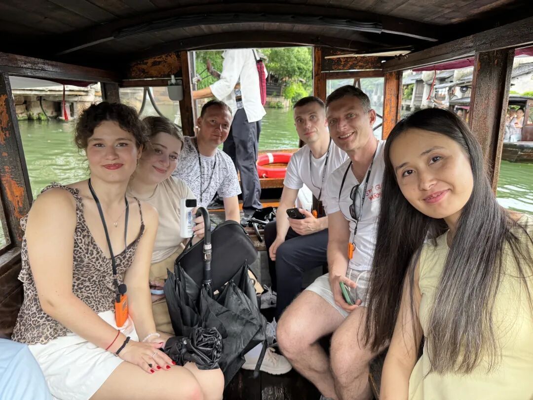 Members of the RANEPA EMBA delegation experience Wuzhen by boat